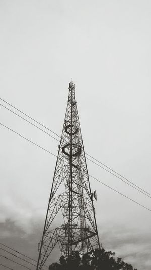 Low angle view of electricity pylon