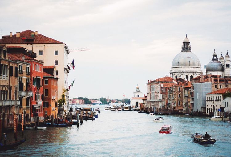 Santa maria della salute by grand canal against sky