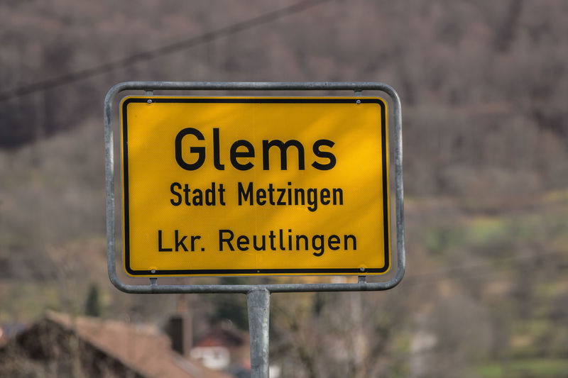 Close-up of town sign