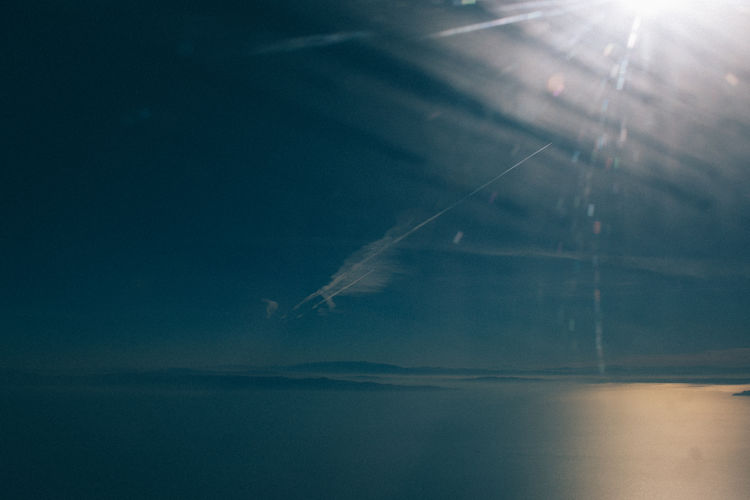 Sun shining through clouds