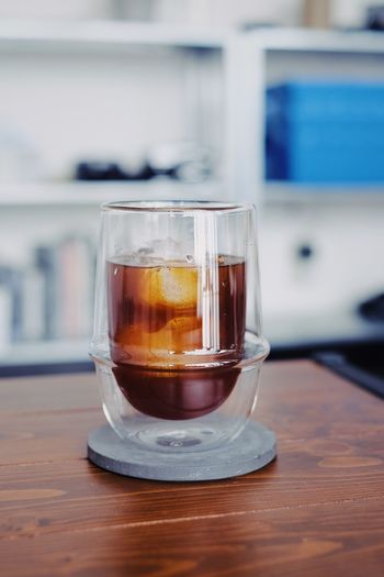 Close-up of tea in glass on table