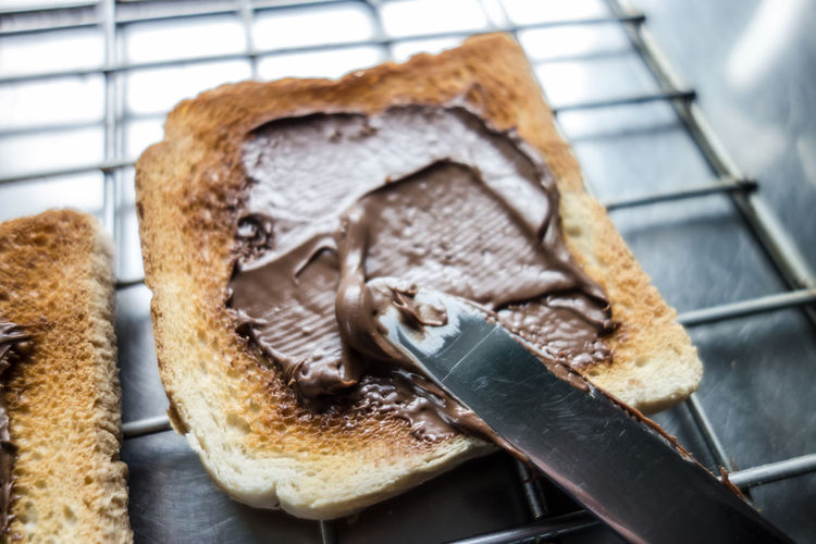 Close-up of chocolate spread on toasted bread
