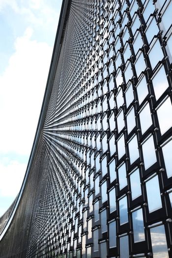 Low angle view of modern building against sky