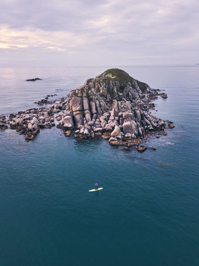 Aerial view of sup surfer ,triozerye, primorsky region, russia