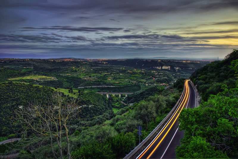 High angle view of highway in city against sky