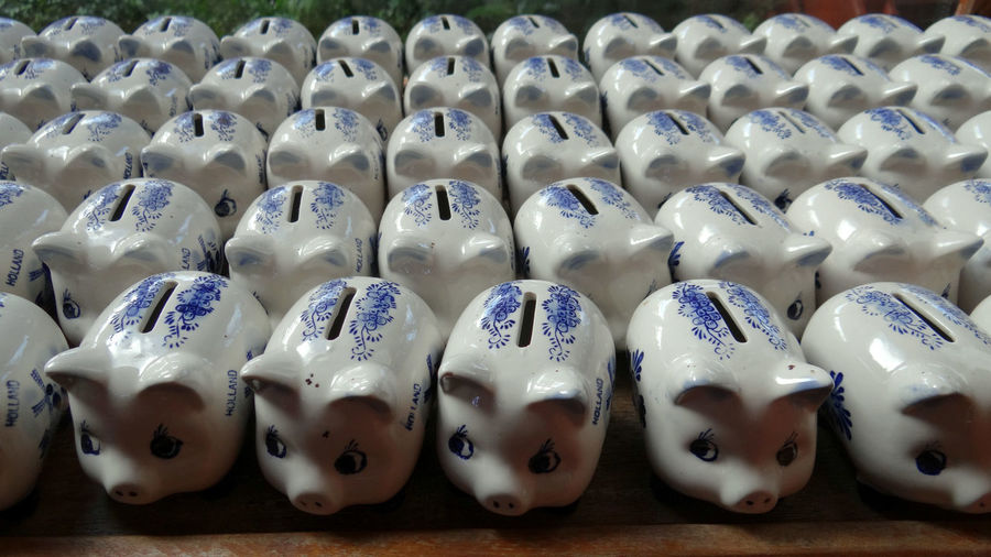 Piggy banks arranged on table for sale