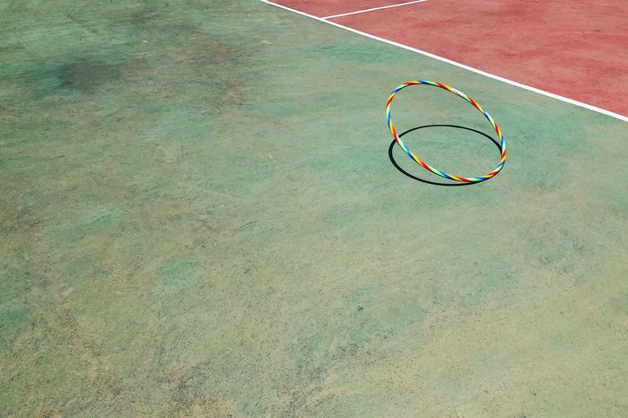 High angle view of hoop at basketball court during sunny day