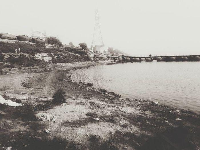Scenic view of water against clear sky