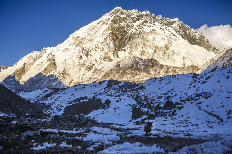 Sunset on a peak near the trail to mt everest base camp, nepal.