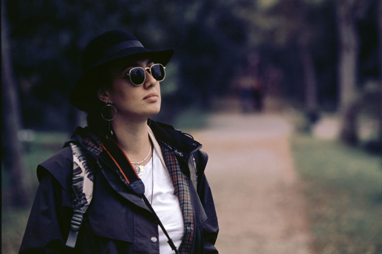 Portrait of senior woman wearing sunglasses standing outdoors