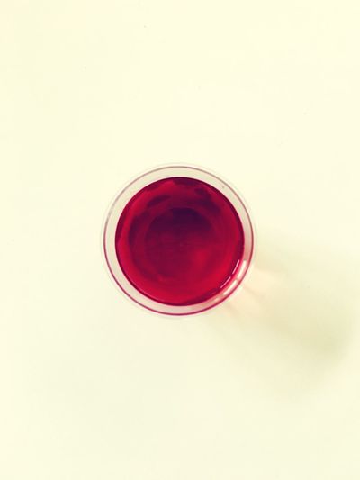 Directly above shot of red drink
