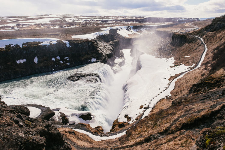 High angle view of gullfoss falls against sky