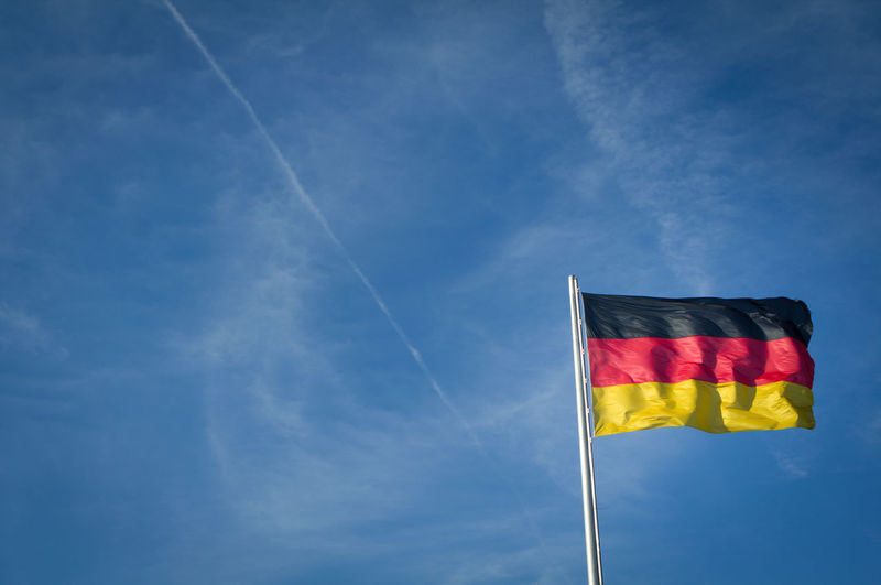 German flag in a blue sky