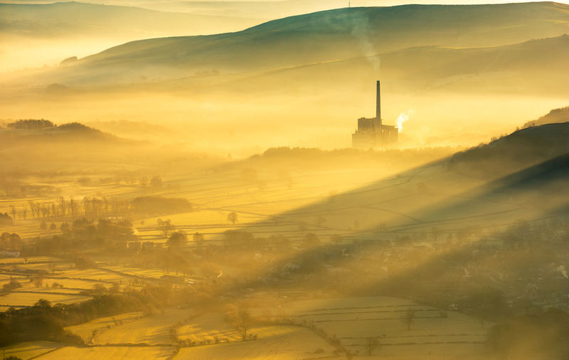 Hope valley cement works bathed in the early morning sun and mist