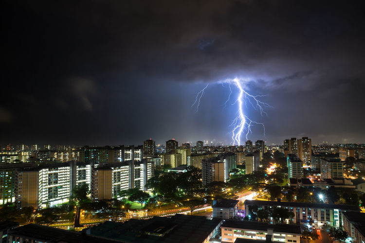 Lightning over singapore city at night