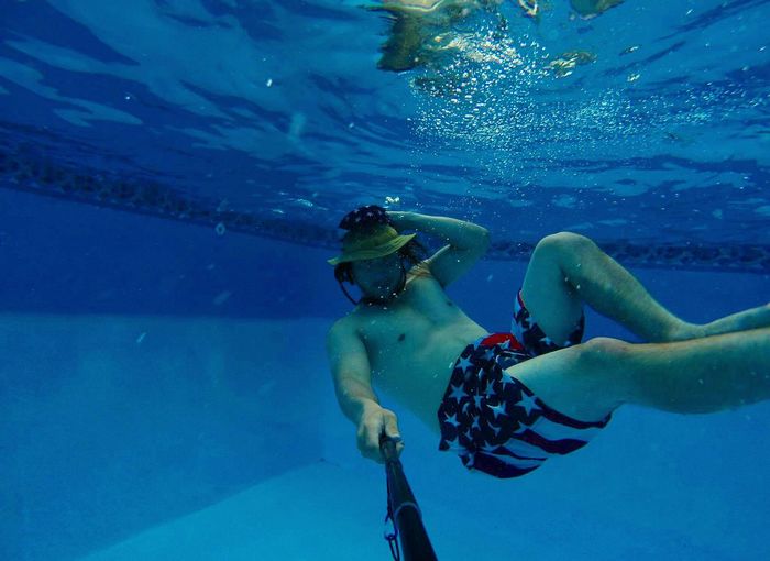 Man taking selfie underwater