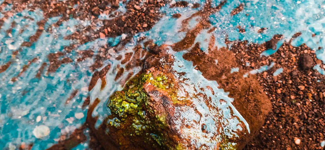 Full frame shot of old rusty rock