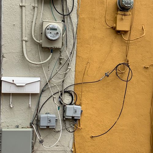 Close-up of electric meter on wall