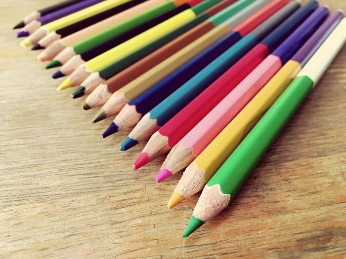 High angle view of colored pencils on table