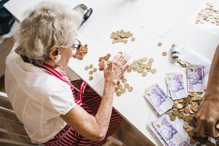 Woman counting coins