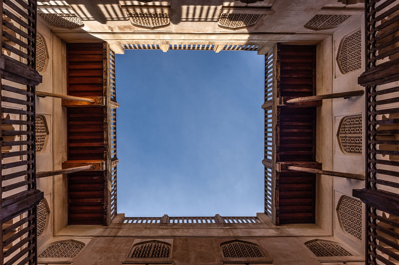 Low angle view of building against sky in oman