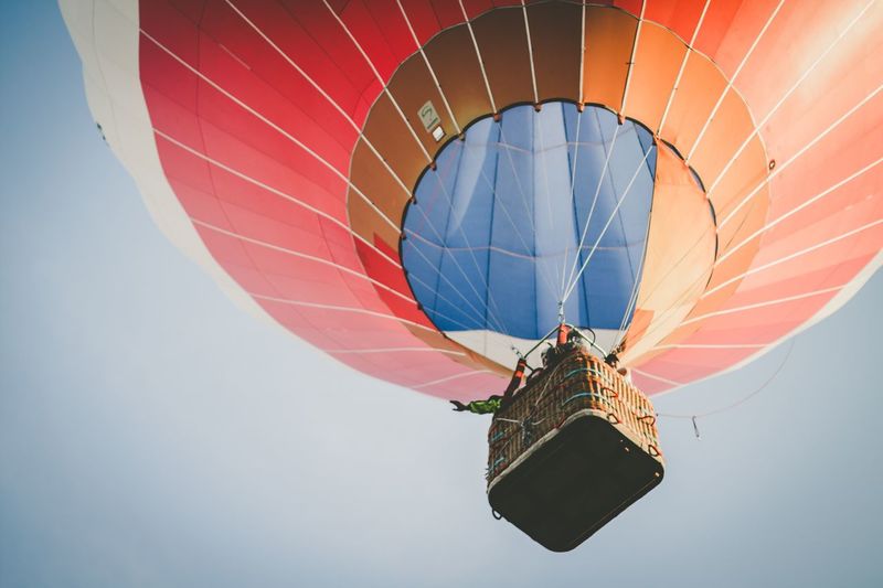 Low angle view of hot air balloon against clear sky