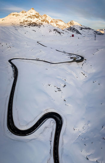 Drone view of a mountain road in the snoa