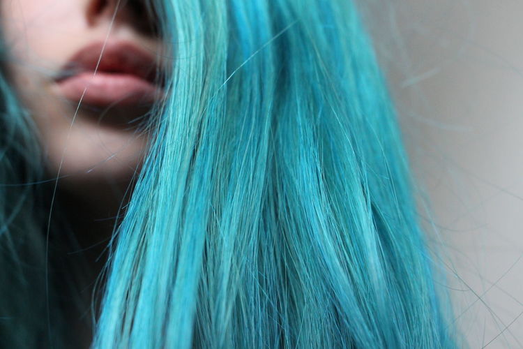 Close-up of young woman with dyed hair