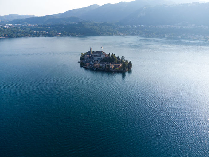 Aerial view of orta san giulio lake and island in piedmont, italy