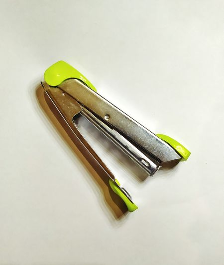 High angle view of pencil on table against white background