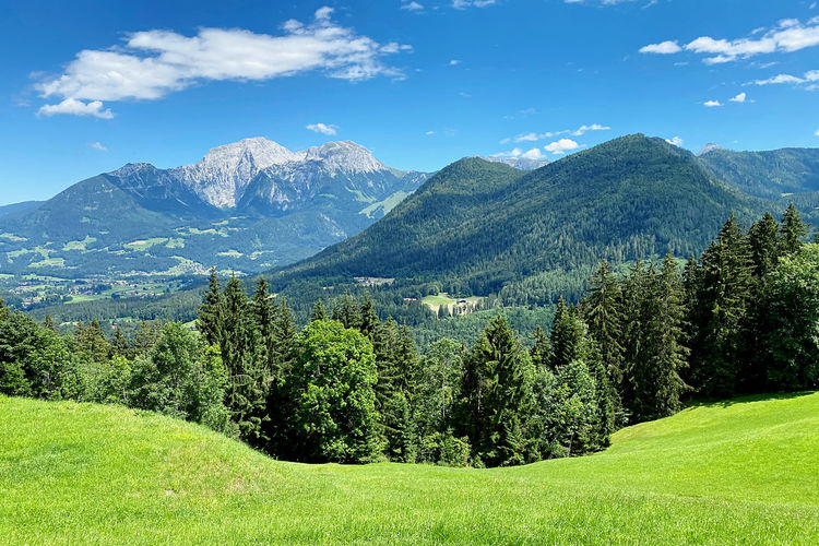 Scenic view of hoher göll and hohes brett against blue and white sky, bavarian alps, ramsau, germany