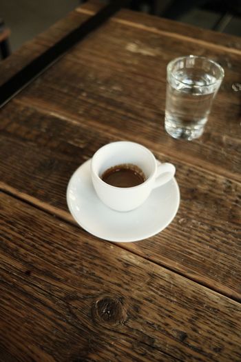 High angle view of coffee cup on table