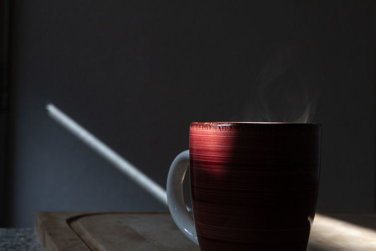 Close-up of coffee cup on table