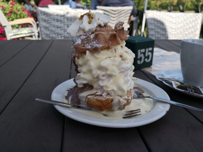 Ice cream in plate on table