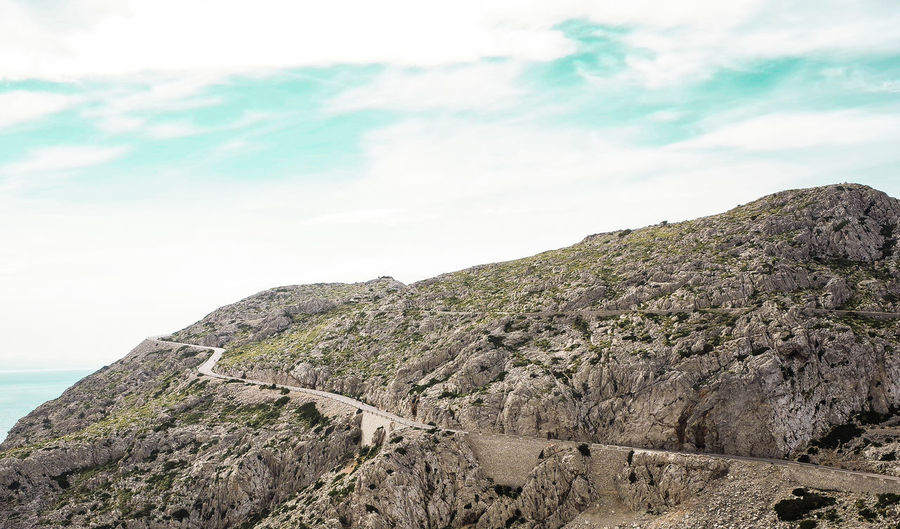 Scenic view of rocky mountains against sky