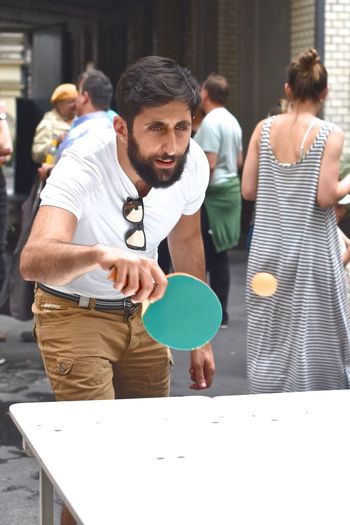 Young man playing table tennis