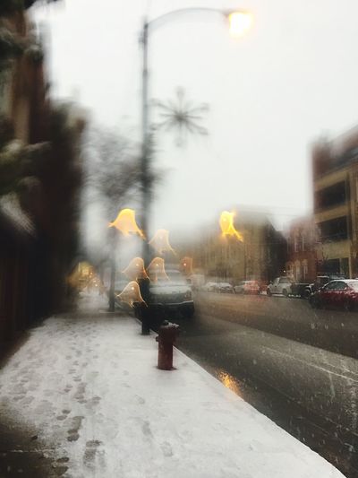 Man on wet street in rainy season