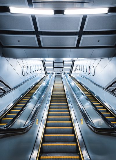 Low angle view of escalator in subway station
