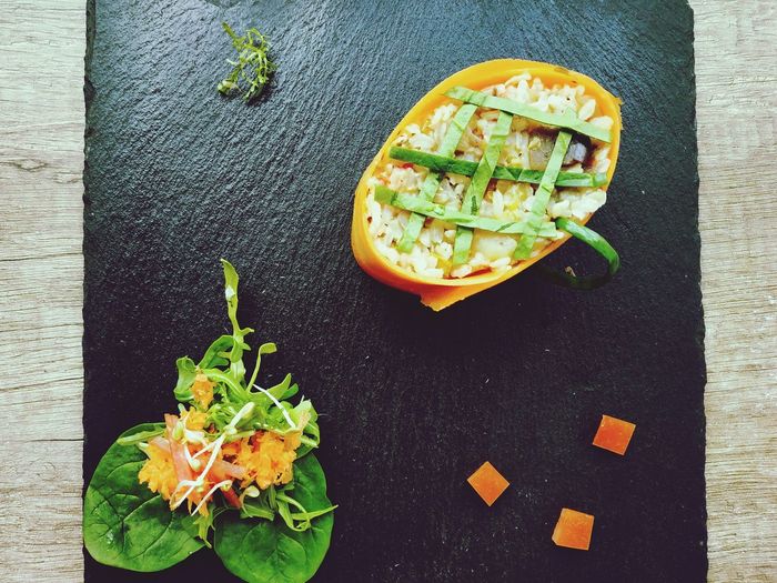 High angle view of chopped fruits on table