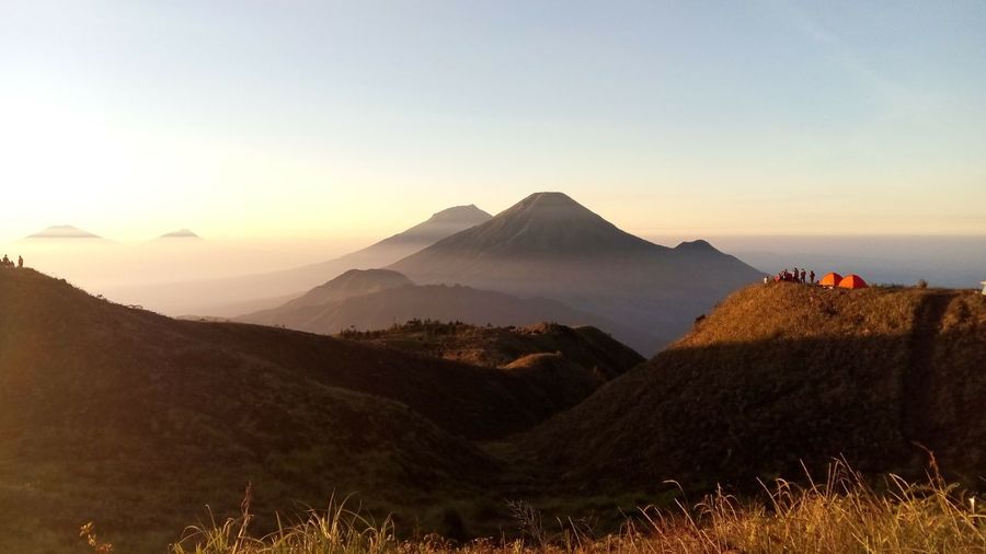 Scenic view of mountains against sky during sunset