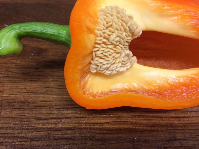 Close-up of orange bell pepper on table