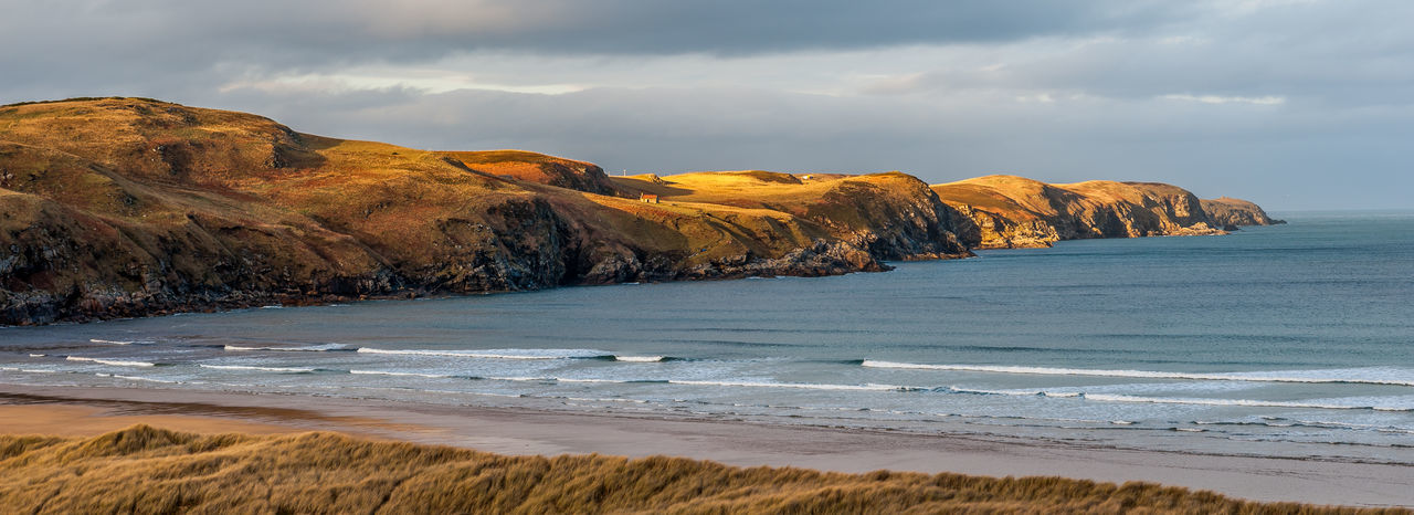 Strathy bay in sutherland located on the north coast of scotland and well known as a surfing beach