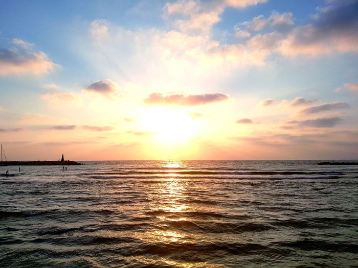 Scenic view of sea during sunset