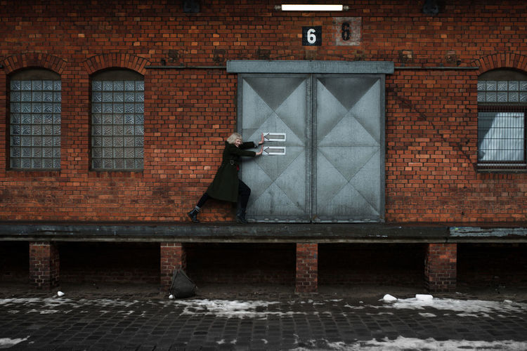 Architecture Brick Wall Building Exterior Built Structure Day Door Female Hamburg Outdoors Pushing #urbanana: The Urban Playground
