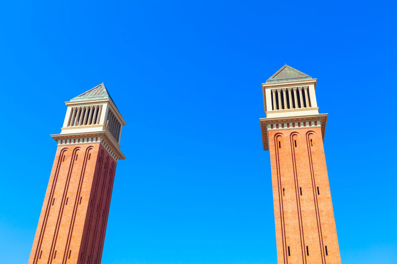 Torres venecianes towers at placa d'espanya in barcelona . pair of towers in barcelona