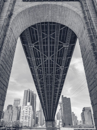 Low angle view of bridge over river in new york city