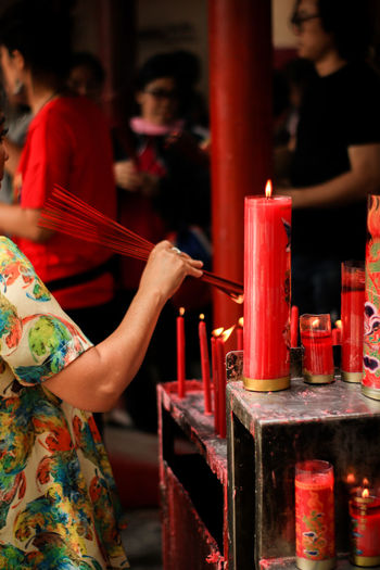 Midsection of woman at temple