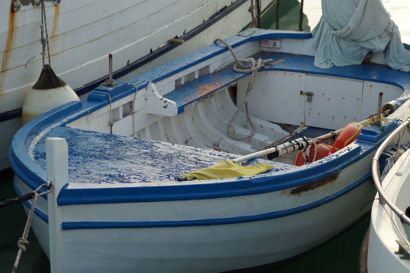 Fishing boats moored in sea