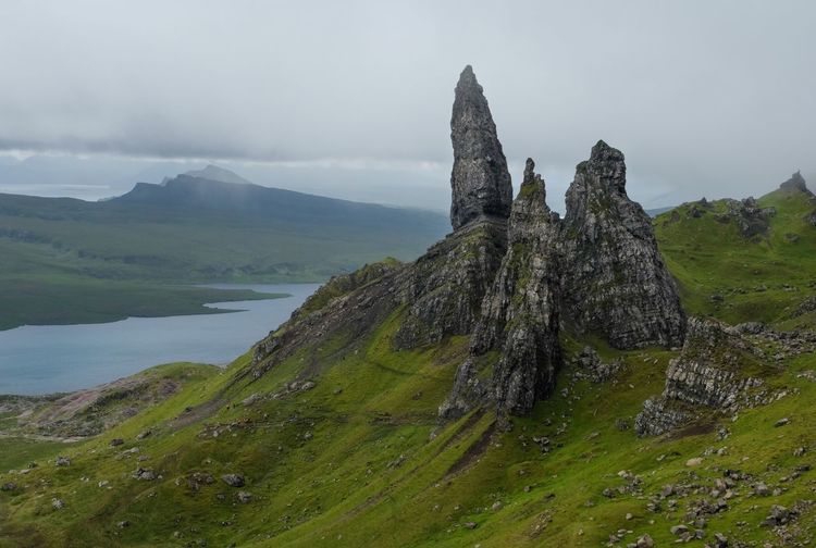 Scenic view of old man of storr against mountains