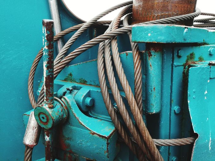 Close-up of rusty cables on machinery
